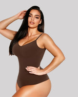 CYRA Bare-Back Sculpt Thong Bodysuit in Cocoa — front view on model