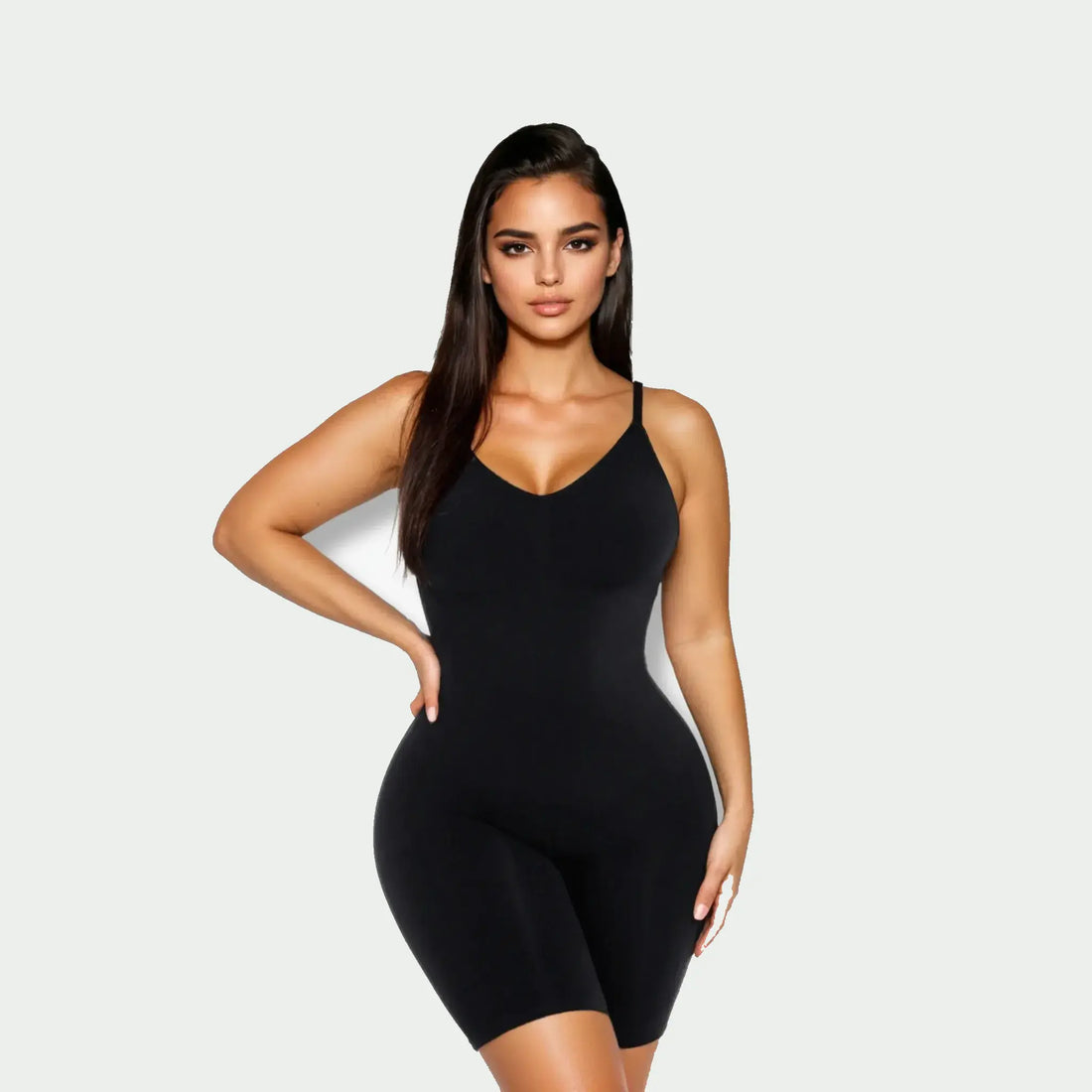 Model wearing the CYRA Low-Back Sculpt Bodysuit in Onyx, front view