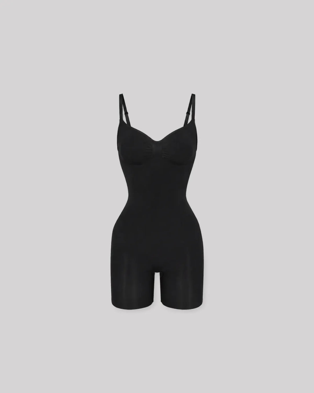 CYRA Sculpt Mid-Thigh Bodysuit in Onyx — front lifestyle view