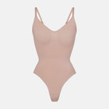 CYRA Sculpt Thong Bodysuit in Sandstone product view